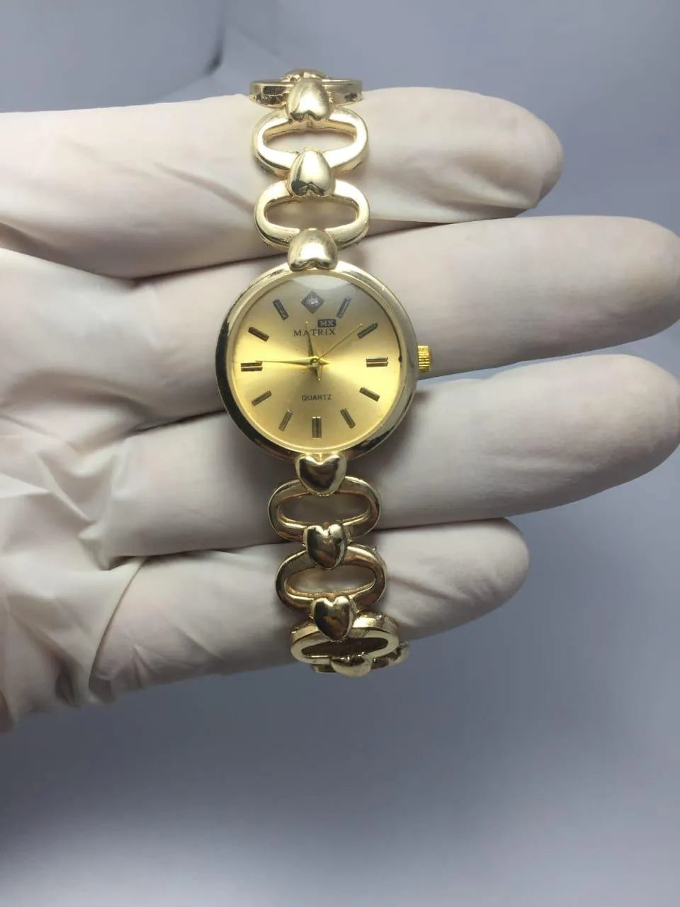 Gold Quartz Watch with Diamond Dial & Three-Hand Display